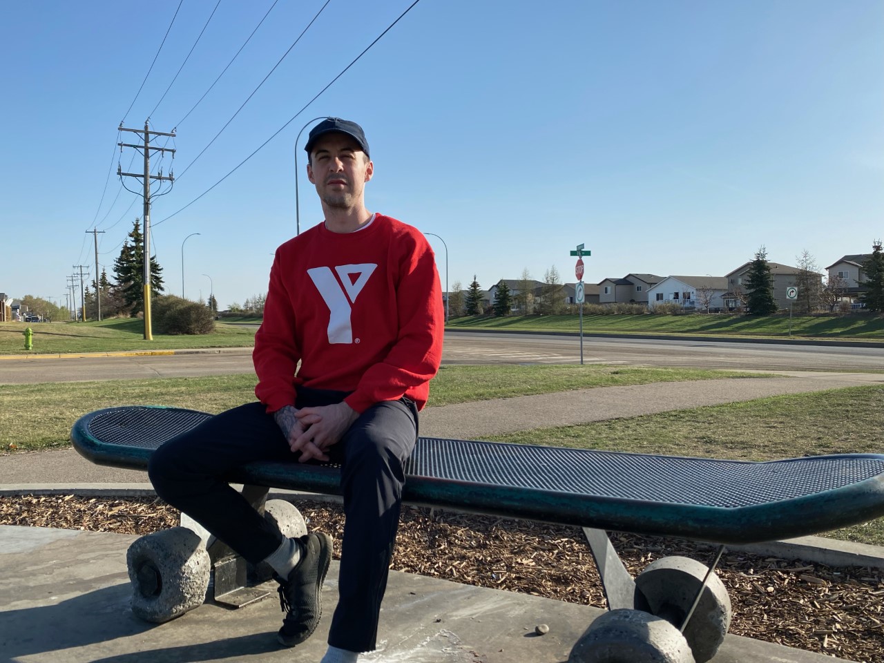 Man on skateboard bench