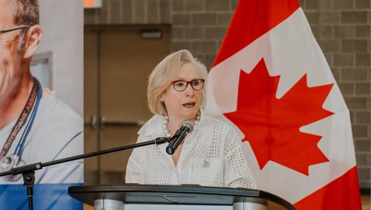 An elected government official speaks at an event.